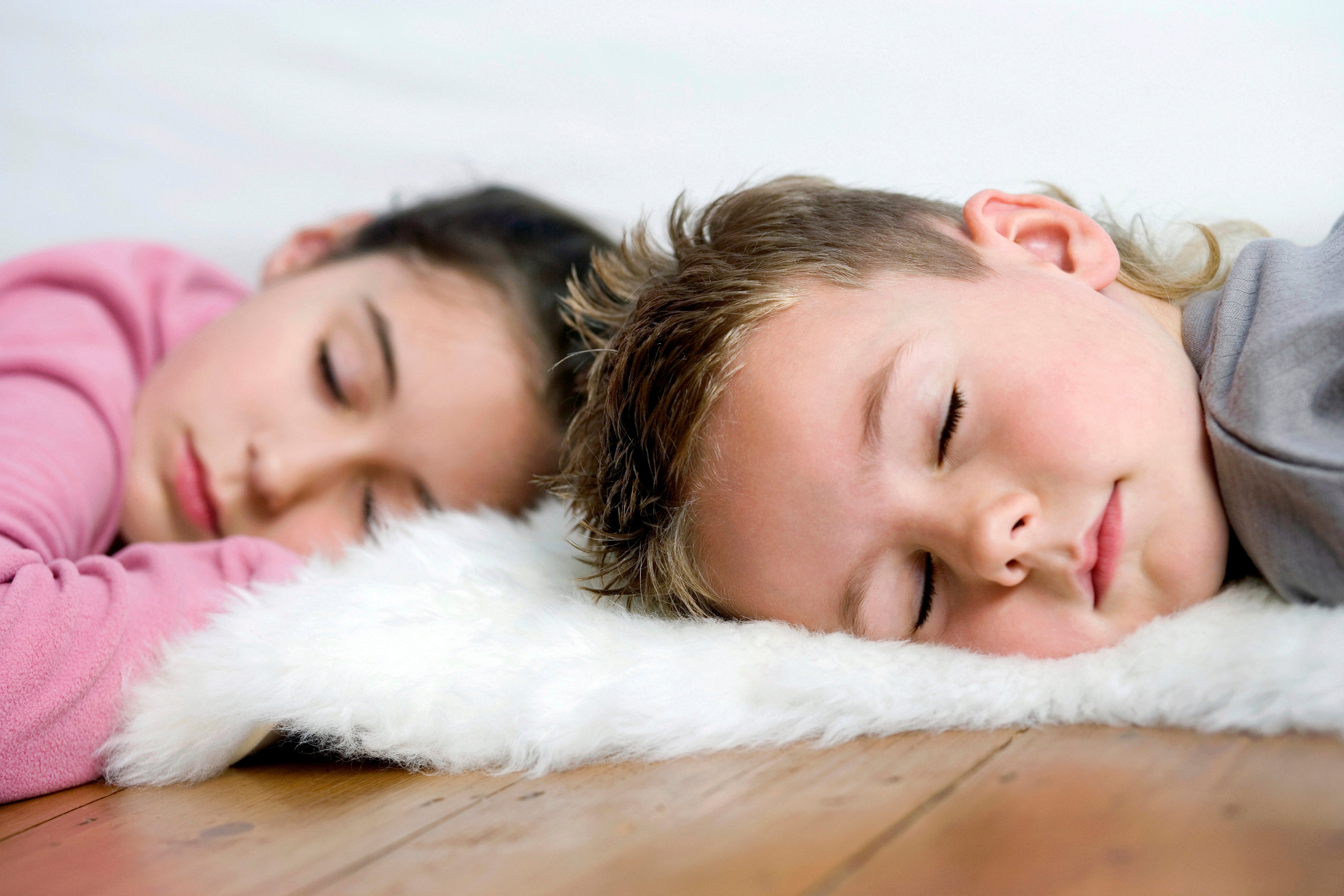 Children sleeping on the floor